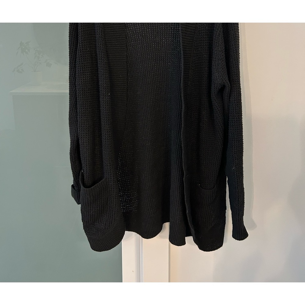 Black cardigan.